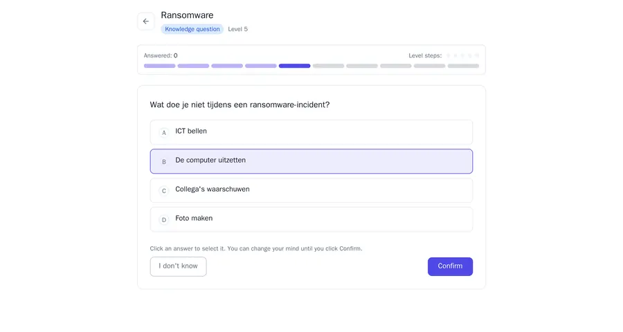 A knowledge question from the Ransomware baseline assessment at Level 5, with four answers, the I don't know button and the Confirm button